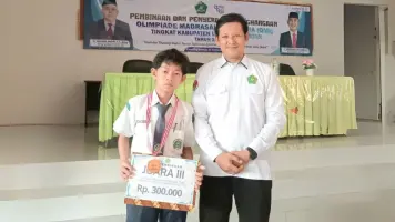 Akmal Maulana Antarkan MTsN 1 Lamsel Raih Prestasi di Olimpiade Madrasah Indonesia